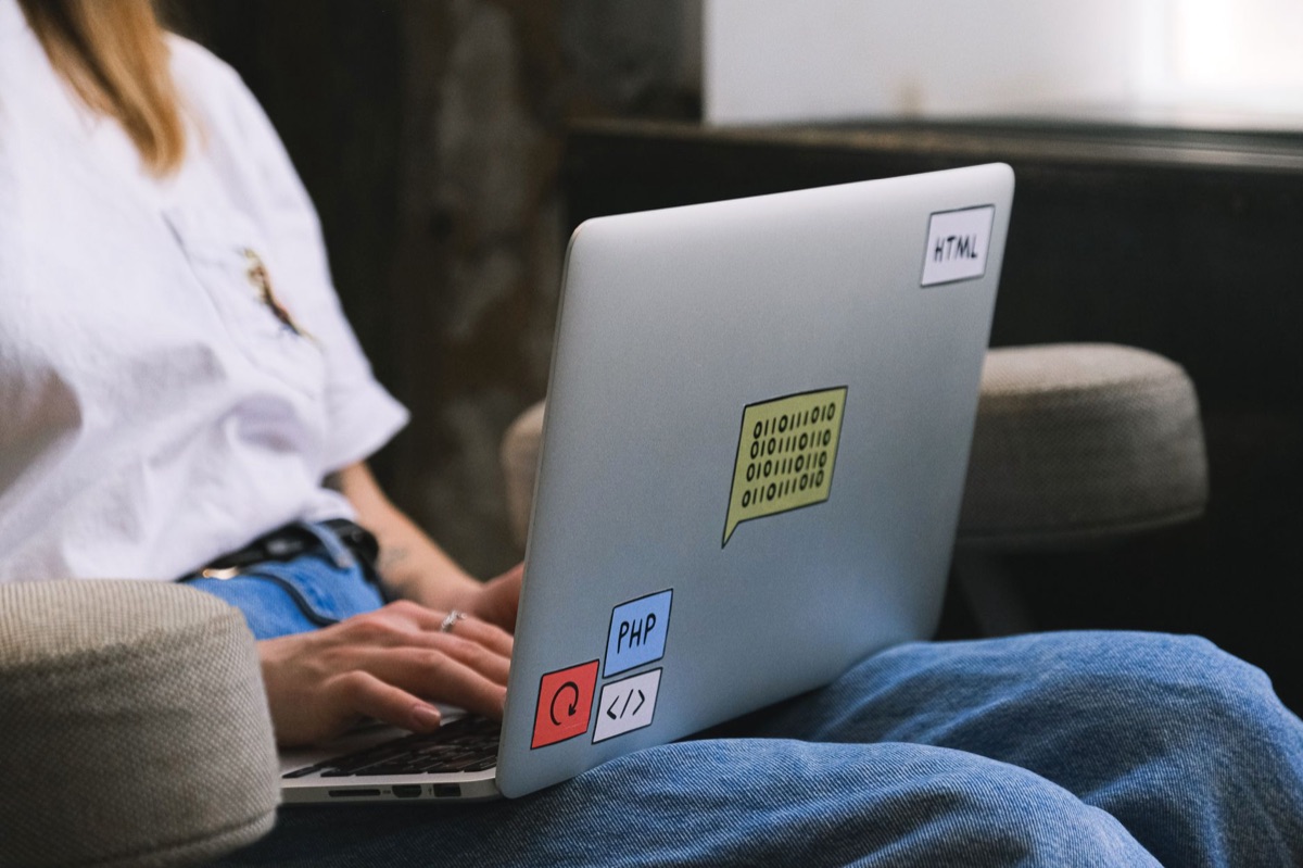 developer using ai coding agent in modern office