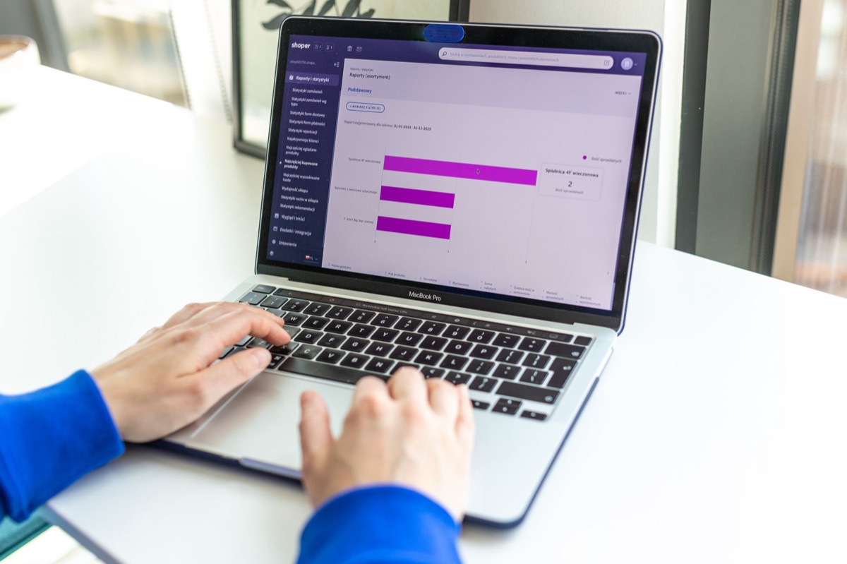 ClickUp interface on laptop showing task management and collaboration features