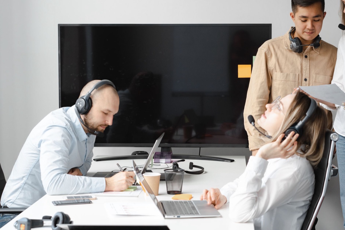 team members using task management software